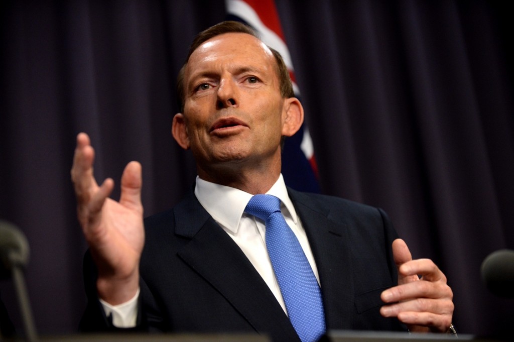 Prime Minister Tony Abbott during a press conference in Canberra, Monday, March, 17, 2014. (AAP Image/Alan Porritt) NO ARCHIVING