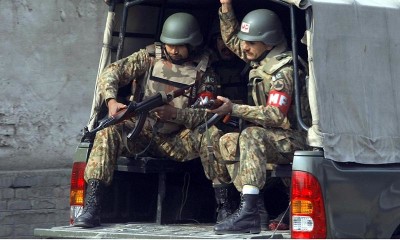 Army personnel arrive at the site of TTP attack on Army Public School situated on Warsak Road - INP Photo