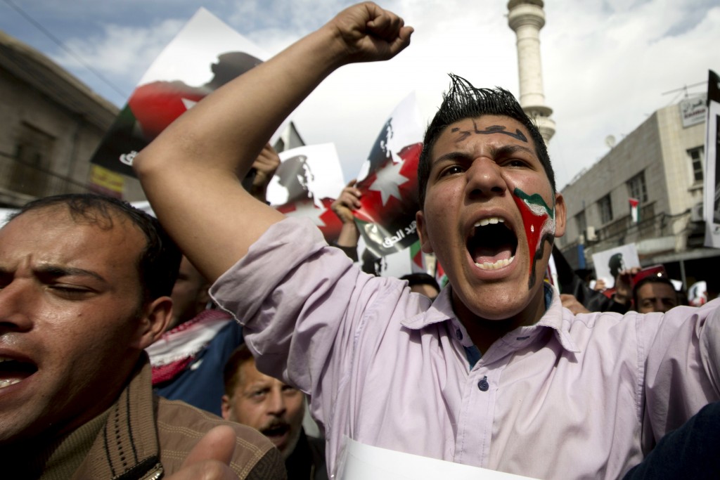 Demonstrators chant anti-ISIS slogans during a rally in Amman, Jordan February 6th. Photo: AP