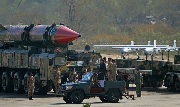 President Mamnoon Hussain inspects a guard of honour alongside long-range ballistic missiles the Shaheen II during the Pakistan Day military parade in Islamabad on March 23, 2015. PHOTO: AFP