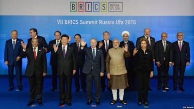 Chinese President Xi Jinping poses for photos with leaders of the Shanghai Cooperation Organization (SCO) members and observers, the Eurasian Economic Union (EEU) leaders, leaders of invited countries and the BRICS nations, namely Brazil, Russia, India, China and South Africa in Ufa, Russia, July 9, 2015