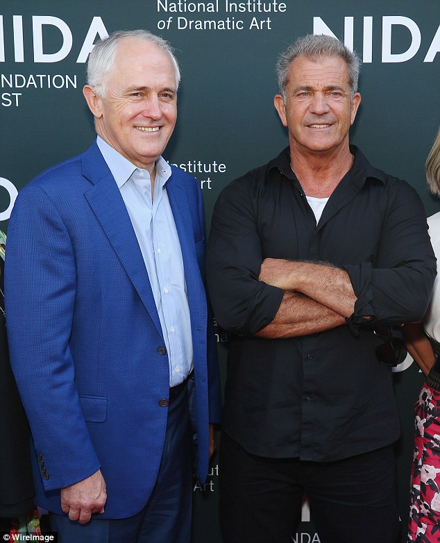 Australian Prime Minister Malcolm Turnbull talks with Mel Gibson ahead of The National Institute of Dramatic Art's new graduate school in Sydney