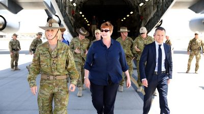 Minister for Defence, Senator the Hon Marise Payne, MP (centre) is greeted and escorted off the Royal Australian Air Force C-17 Globemaster at Hamid Karzai International Airport by (left) Brigadier Cheryl Pearce, Commander Task Group Afghanistan and (right) the Ambassador to Afghanistan Mr Richard Feakes.