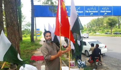 Along with Pakistan flags, some vendors are also selling Chinese flags to express solidarity and friendship with China. Photo: Islamabad Scene