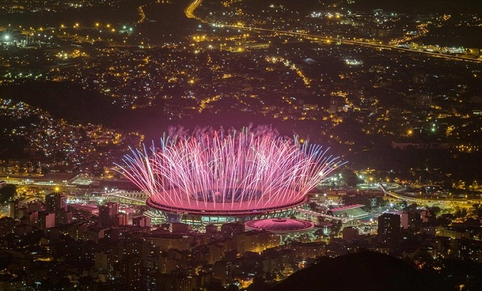 Fireworks are seen during the Opening ceremony for Rio 2016 Olympic games at Maracana Stadium in Rio de Janeiro on August 5, 2016. / AFP PHOTO / YASUYOSHI CHIBAYASUYOSHI CHIBA/AFP/Getty Images Photo: Yasuyoshi Chiba/AFP/Getty Images