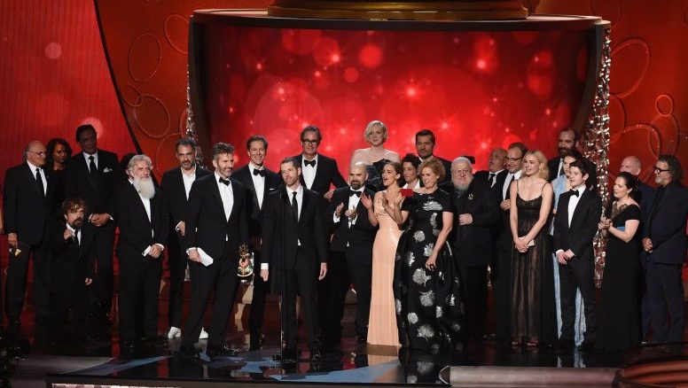 Writer/producers David Benioff and DB Weiss with production crew accept outstanding drama series for Game of Thrones. Photograph: Kevin Winter/Getty Images