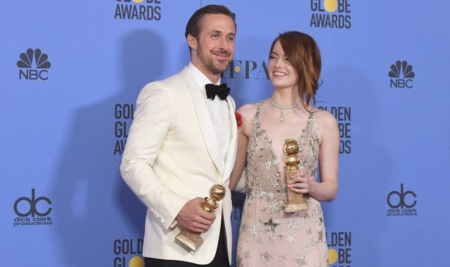 'La La Land' stars, Ryan Gosling and Emma Stone, with their awards at Golden Globes 2017