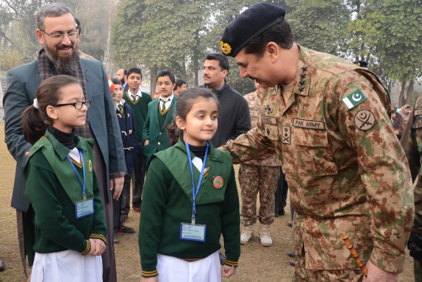 Army chief Raheel Sharif speaks with students at Peshawar Army Public School that reopened on January 12.  Photograph: AFP/Getty Images
