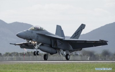 A Royal Australian Air Force F-18 Hornet performs at the Australian International Airshow on the Industry Expo day at the Avalon Airfield, southwest of Melbourne, Australia, Feb. 24, 2015. (Xinhua/Bai Xue)