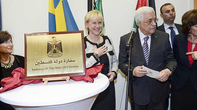 Palestinian President Mahmoud Abbas (C, right) speaks next to Swedish Foreign Minister Margot Wallstrom (C) during the inauguration of the Embassy of Palestine in central Stockholm February 10, 2015. (Reuters/Fredrik Sandberg)