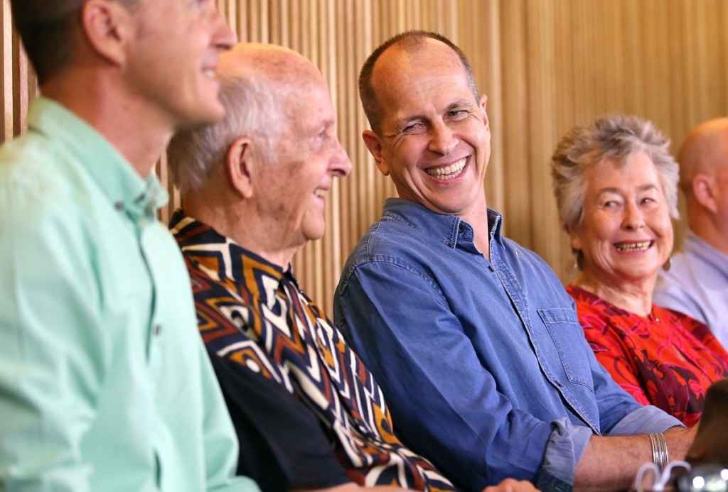 Australian journalist Peter Greste (2nd R) smiles as he sits next to his mother Lois (R) and father Juris (L) during a media conference in Brisbane February 5, 2015. Photo: Reuters/Nathan Richter