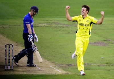 Mitchell Marsh of Australia celebrates after taking a wicket during the 2015 ICC Cricket World Cup match between England and Australia at Melbourne Cricket Ground on February 14, 2015 in Melbourne, Australia. (February 13, 2015 - Source: Shaun Botterill/Getty Images AsiaPac)