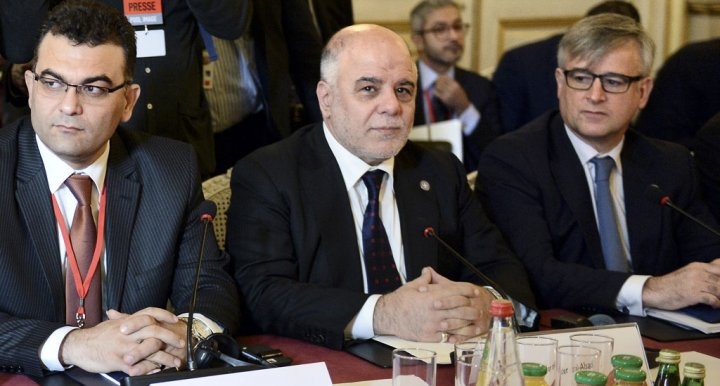 Iraqi Prime Minister Haydar al-Abadi, center, and members of the anti-Islamic State coalition meet in Paris, France, to discuss strategy in fighting the jihadists who have made key battlefield advances in recent weeks in Iraq and Syria, Tuesday, June 2, 2015.