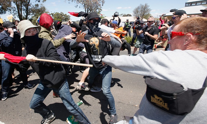 Reclaim Australia protesters and anti-racism demonstrators scuffle in Melton on Sunday, the site of a proposed mosque. Photograph: Darrian Traynor/Getty Images