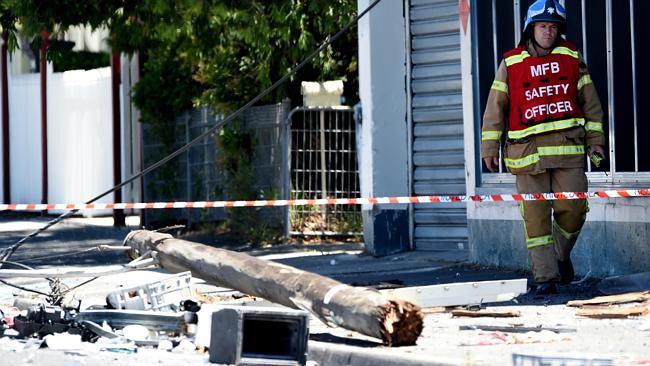 A power pole lies on its side after the explosion. Photo Source:News Corp Australia