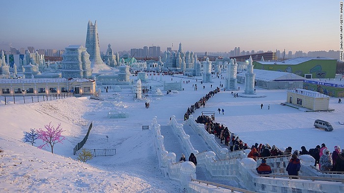 People wait in line at the China Ice and Snow World on the eve of the opening ceremony of the Harbin International Ice and Snow Festival in Harbin, northeast China’s Heilongjiang province on January 4, 2016. (WANG ZHAO/AFP/Getty Images)