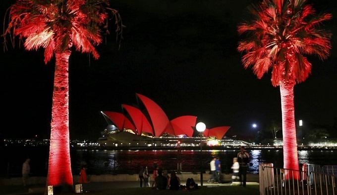 The Sydney Opera House is bathed in red light to mark the beginning of Lunar New Year celebrations.
