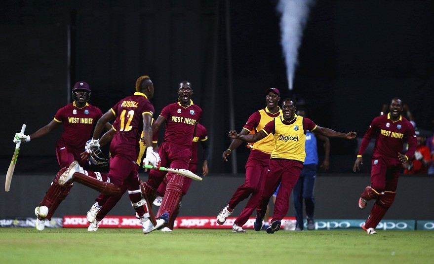 Andre Russell runs towards his team-mates after taking West Indies home, India v West Indies, World T20 2016, semi-final, Mumbai, March 31, 2016 ©Getty Images