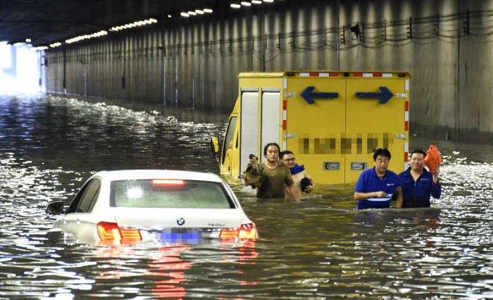 Hundreds of flights cancelled, train services suspended as Beijing, Tianjin lashed by torrential rain