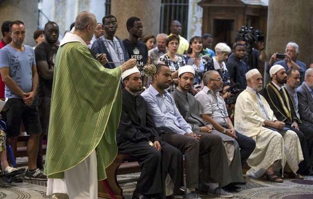 Muslims attend a Mass in Rome’s Saint Mary in Trastevere church, Italy, Sunday, July 31, 2016. (Massimo Percossi/Ansa via AP)