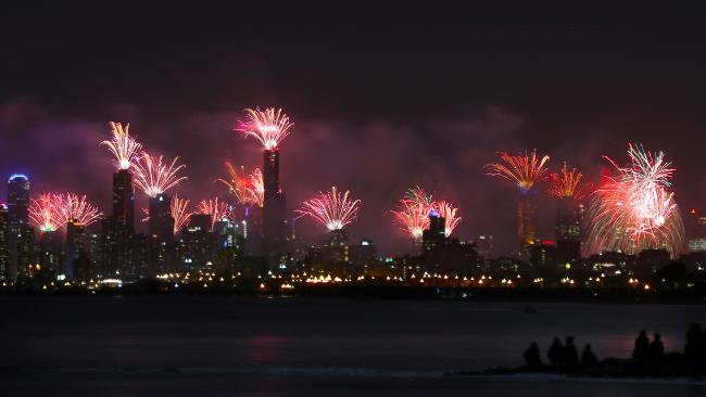 NYE Fireworks over Melbourne CBD from Green Point in Brighton. Picture: David Crosling. Source:News Corp Australia